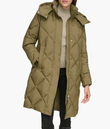 A long olive green, quilted coat with a detachable hood, zip and snap button closure, featuring two front pockets.