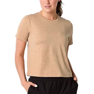 Tan short-sleeve crew-neck shirt paired with black pants.