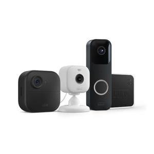 The Blink Whole Home Bundle includes four security cameras: two compact outdoor cameras, an indoor camera with a stand, and a video doorbell.