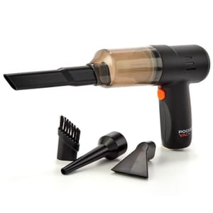The Cordless Pocket Vacuum & Blower is a handheld, black device with an orange button, featuring multiple attachments: a long nozzle, a brush, a narrow tip, and a flat nozzle for versatile cleaning tasks.