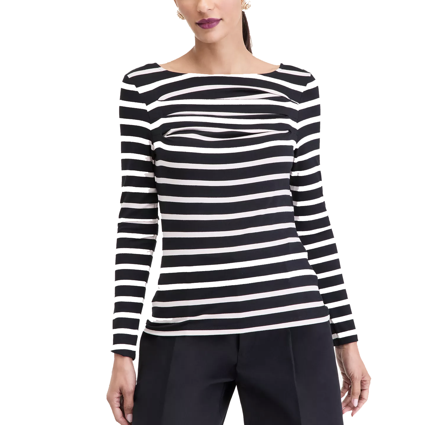 A woman wearing a black and white striped long-sleeve top with a boat neckline and slight ruching across the chest, paired with dark trousers.
