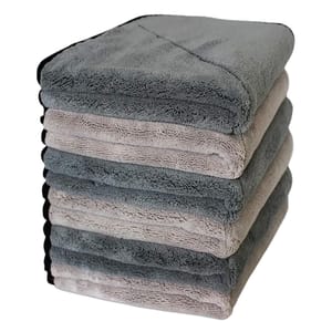 A stack of six microfiber drying towels in alternating light and dark gray shades, each measuring 16 inches. The towels have a plush texture and black edge trimming.