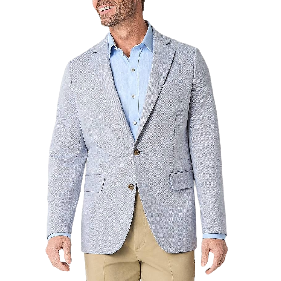Light gray blazer, blue button-up shirt, and khaki pants on a man without his head visible.