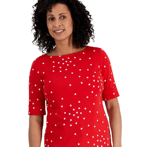 Style & Co. Star-Printed Top features a bright red color with scattered white star patterns, elbow-length sleeves, and a round neckline, offering a casual yet festive look.