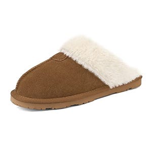 Brown suede women's slipper with a plush white faux fur lining and a sturdy, flat rubber sole for indoor and outdoor use.