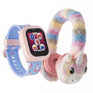 A children's smartwatch with a pastel unicorn-themed strap and a pair of plush, colorful unicorn headphones featuring a glittery horn and fluffy fabric.