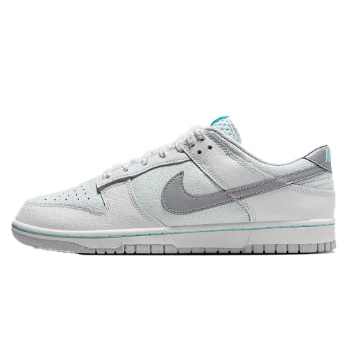 A pair of white and light blue Nike Dunk low shoes.