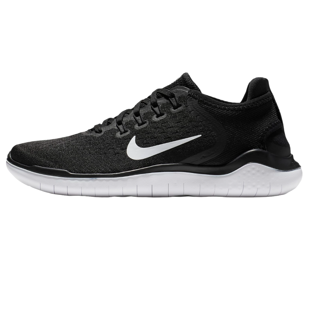 Nike Free Run 2018 shoes feature a black mesh upper with a prominent white Swoosh logo, offering flexibility and lightweight comfort. They have a rounded lace system and a white cushioned sole for enhanced natural movement.