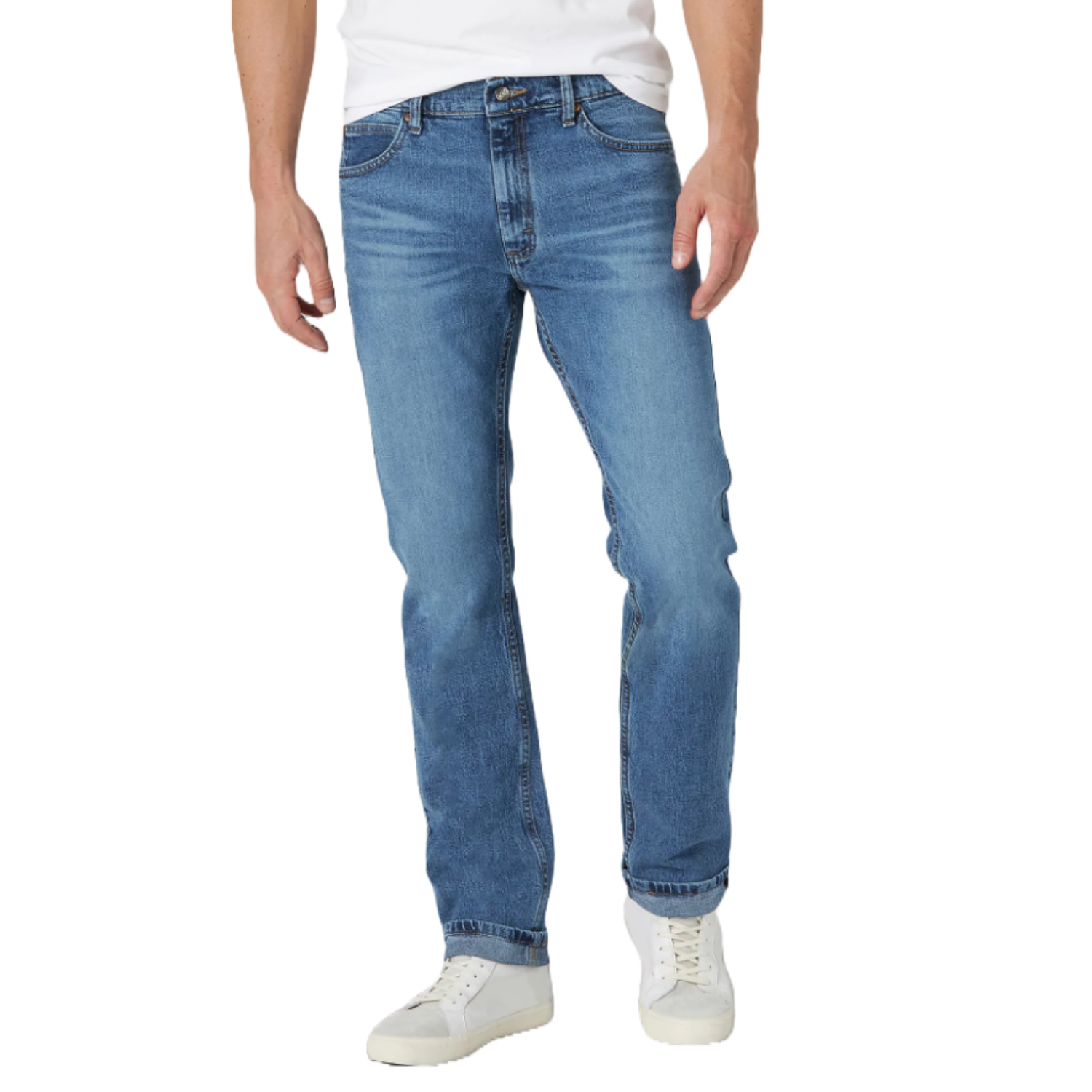 A person wearing light blue jeans and white sneakers.