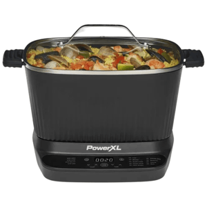 A PowerXL multi-cooker with a digital control panel, featuring a clear lid and handles, filled with a seafood and rice dish.