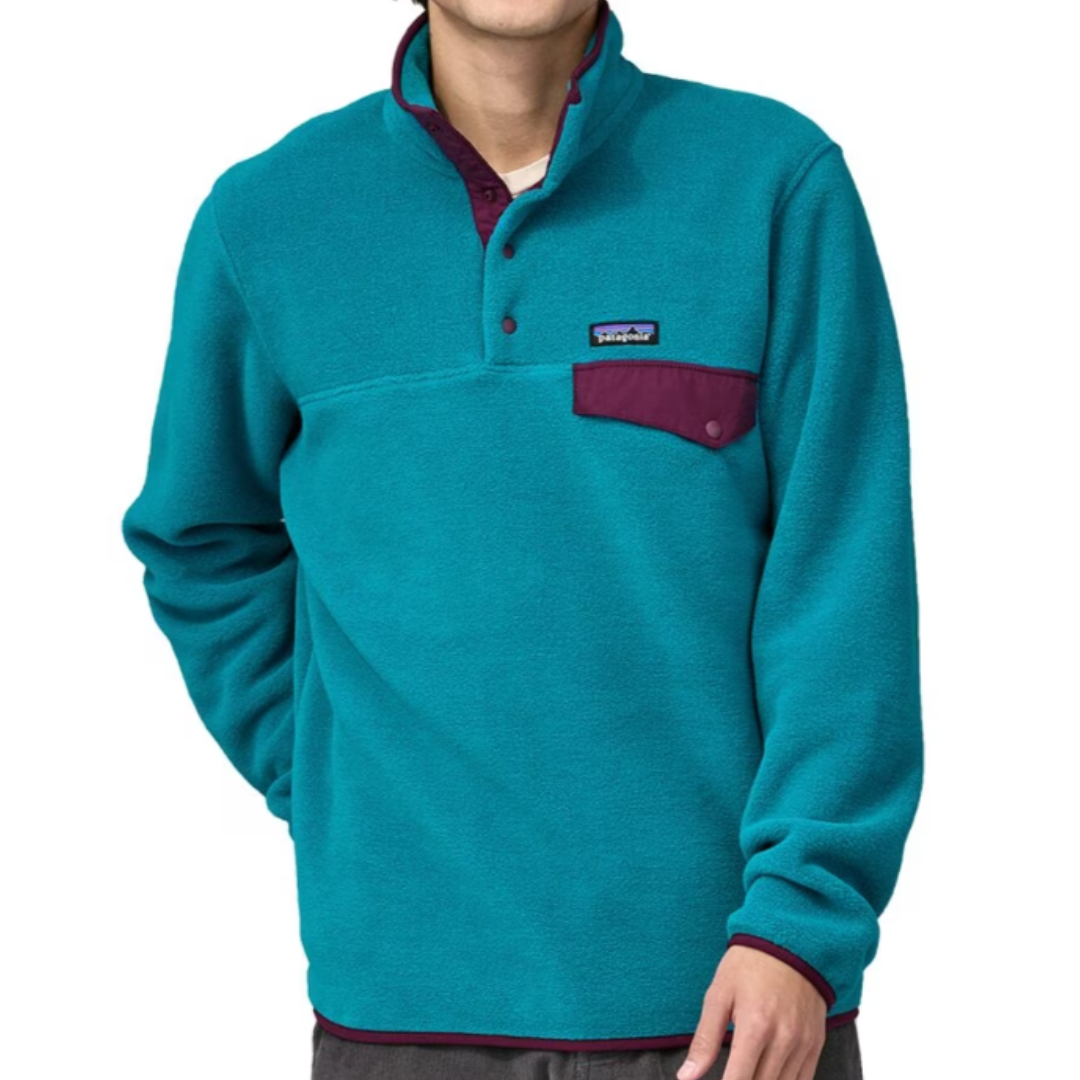 A teal fleece pullover with a snap-button chest placket and maroon pocket detail.