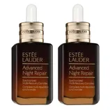 Two bottles of Estée Lauder Advanced Night Repair Synchronized Multi-Recovery Complex with droppers, gold caps, and a dark amber gradient design.