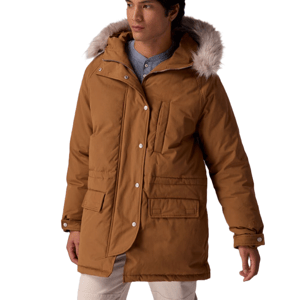 A brown winter parka with a fur-lined hood, buttoned front closure, and multiple pockets, worn by a model.