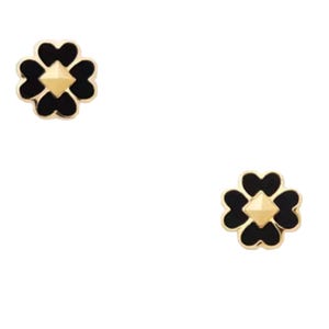 Gold and black stud earrings in a clover shape with heart-shaped petals and a pyramid center.