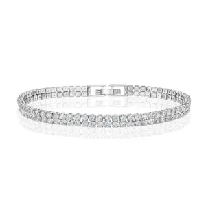 A sparkling silver bracelet adorned with two rows of diamond-like stones, featuring a clasp closure.