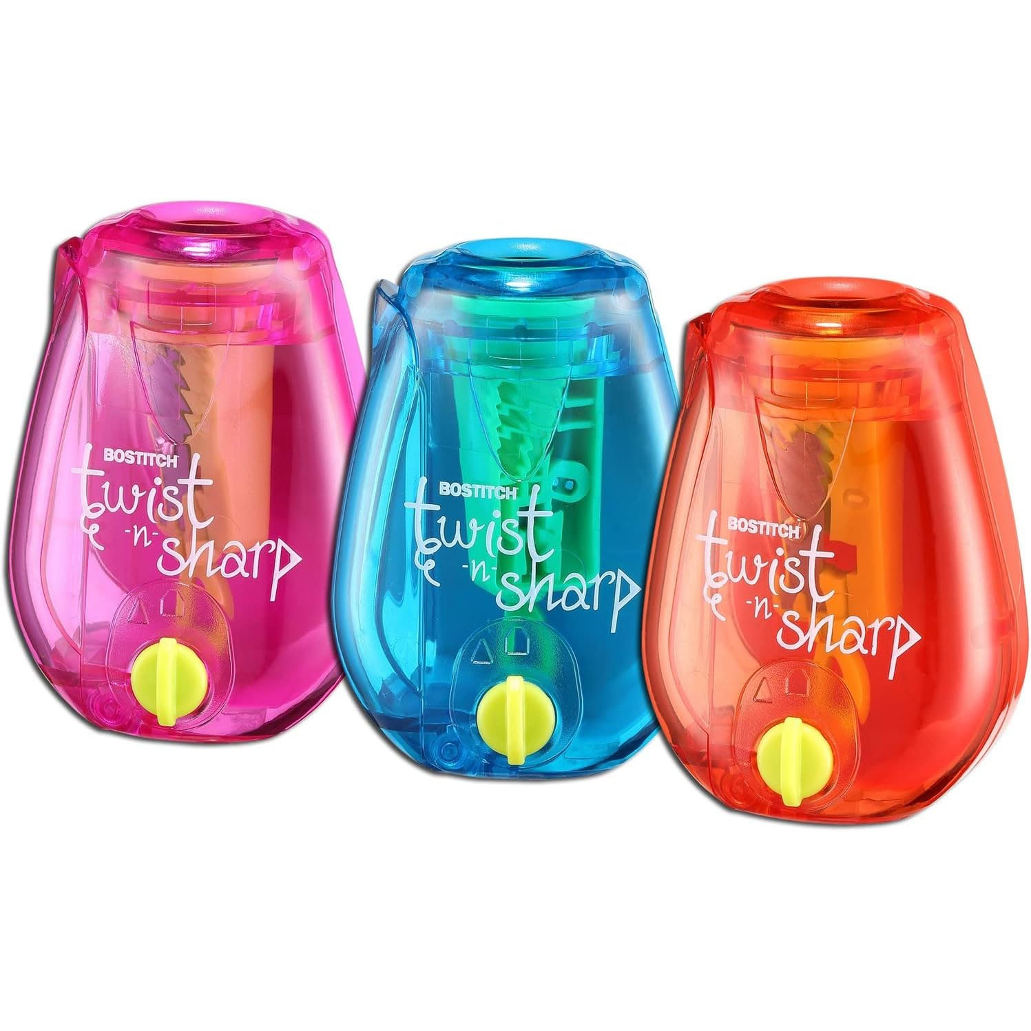 Three colorful pencil sharpeners labeled \“Bostitch Twist n' Sharp\“ in pink, blue, and red with transparent casings and yellow knobs.