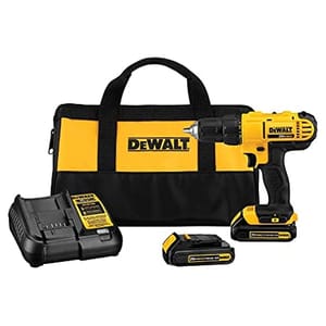 A DeWalt cordless drill with a yellow and black color scheme, accompanied by two batteries and a charger, all inside a matching carry bag.