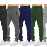 Five pairs of jogger pants in black, gray, navy, green, and light gray, each featuring zippered side pockets and paired with white sneakers.