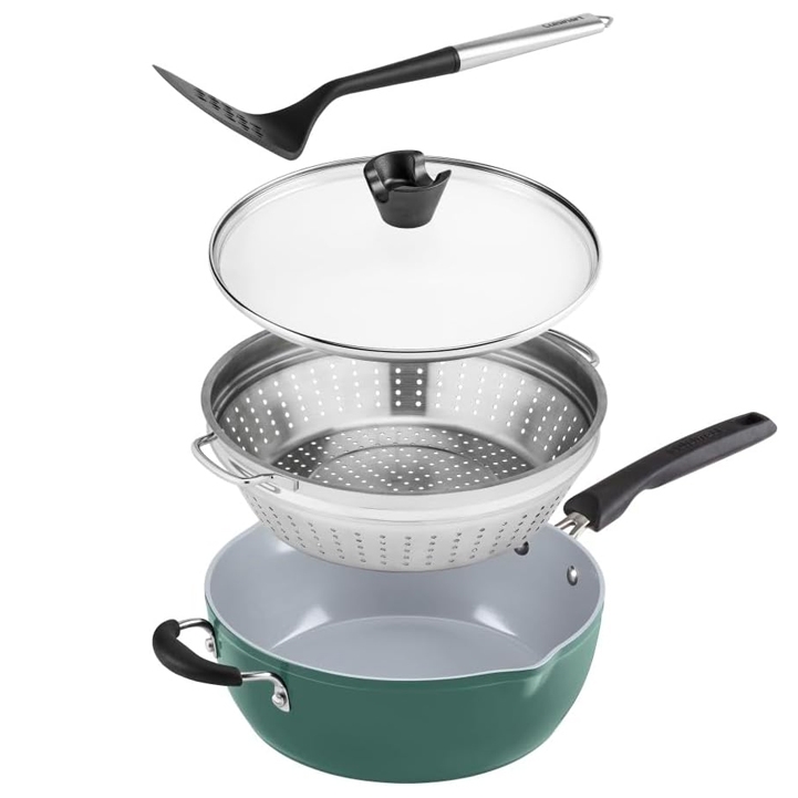 A 4-piece cookware set including a green nonstick saucepan, stainless steel steamer basket, glass lid, and a black spatula.