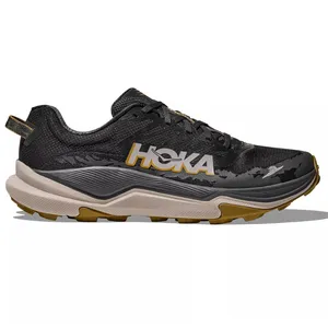 Hoka trail running shoe in black with tan accents, featuring a cushioned sole and textured design for enhanced grip and support.