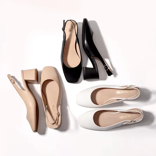Three pairs of women's slingback shoes are displayed: one in beige with a block heel, one in black with a mid heel, and one in white with a low heel.