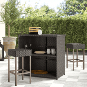 Outdoor bar set with a wicker design includes two bar stools and a bar counter with shelves, featuring decorative bowls and glasses.