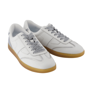 White sneakers with gray laces and gum soles, featuring a sleek design and stitch detailing.