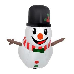 Inflatable snowman decoration with a black top hat, red and white striped scarf, green bow tie, and stick arms. Features a smiling face with an orange carrot nose.