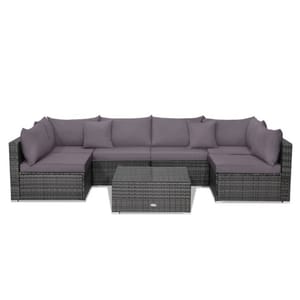 7-piece patio set with an L-shaped sectional sofa and rectangular coffee table, featuring dark gray rattan with light gray cushions.