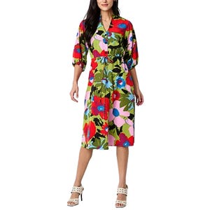 A vibrant floral midi dress with a fit-and-flare silhouette, featuring a button-down front, 3/4 sleeves, and a colorful pattern in red, blue, green, and pink.