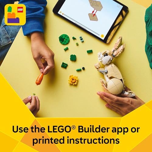 Two people are assembling a LEGO model of a rabbit using pieces shown on a table, guided by digital instructions on a tablet. The image promotes the use of LEGO Builder app or printed instructions.