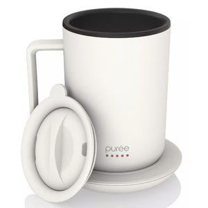 White mug with a lid and matching coaster, featuring the brand \“purée\“ on the front.