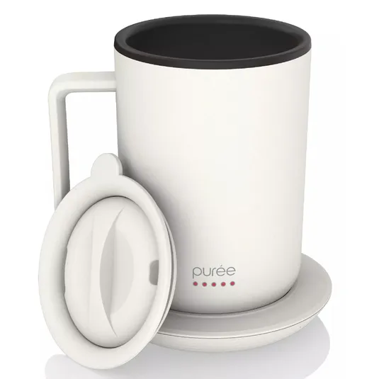 White mug with a lid and matching coaster, featuring the brand \“purée\“ on the front.