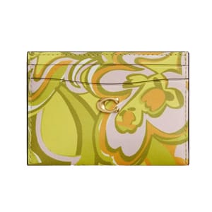 Card holder with a vibrant, abstract green and orange pattern, featuring a gold \“C\“ emblem in the center.