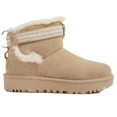 Tan suede ankle boot with white fur lining, textured knit ankle strap, and a durable, grooved sole.