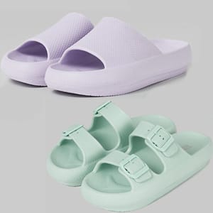 Two pairs of casual footwear, with the top being lilac slide-on slippers and the bottom mint green strappy sandals.