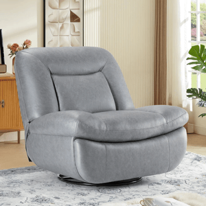 A gray leather swivel chair with a rounded, cushioned design is set in a cozy living room, featuring a patterned rug, a wooden cabinet, wall art, and a window with curtains.