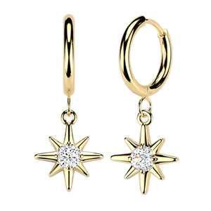 Gold hoop earrings with eight-point star pendants featuring central clear gemstones.