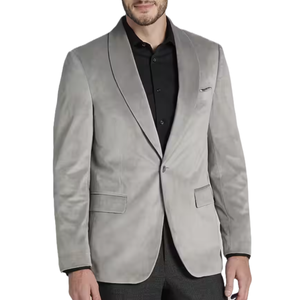 A gray velvet dinner jacket featuring a shawl collar, single-button closure, and two front flap pockets, paired with a black shirt.