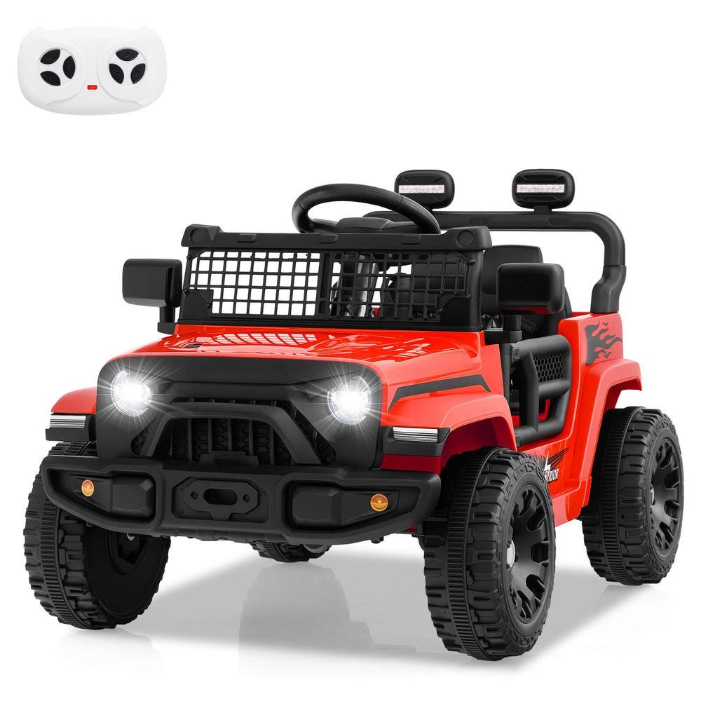 A red toy ride-on Jeep with realistic features, including a grille, headlights, and rugged tires, accompanied by a simple white remote controller for adult supervision.