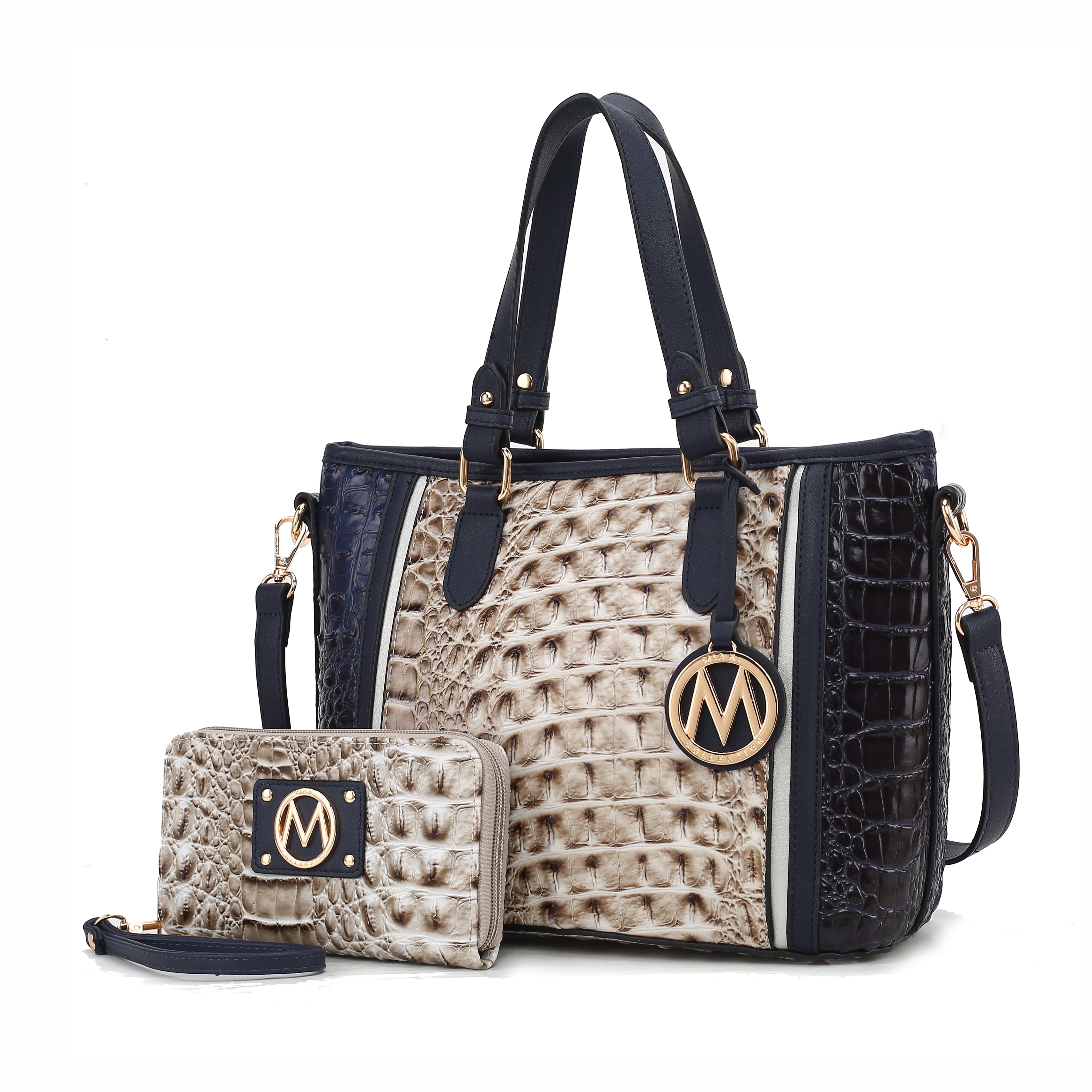 MKF Embossed Tote & Wristlet Wallet features a textured faux crocodile pattern in beige and dark blue with gold-tone hardware and an \“M\“ emblem; includes a tote with dual handles and a detachable shoulder strap, plus a matching wristlet wallet.