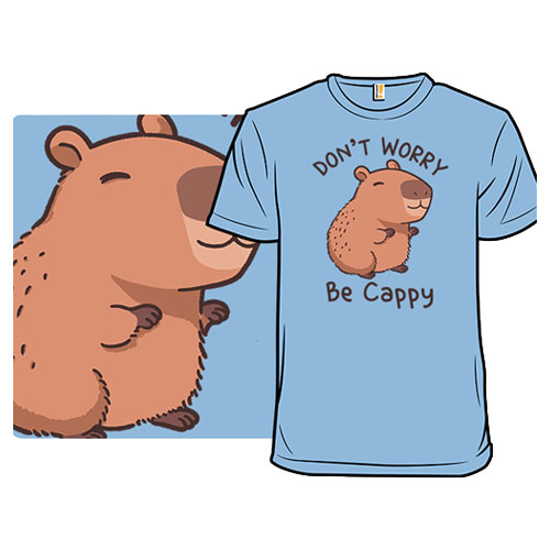Light blue t-shirt featuring a cartoon capybara and the text \“Don't Worry, Be Cappy.\“