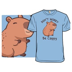 Light blue t-shirt featuring a cartoon capybara and the text \“Don't Worry, Be Cappy.\“