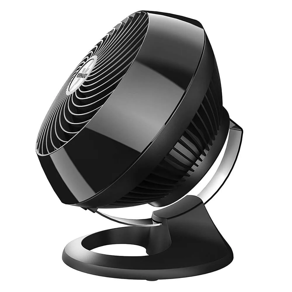 Black circular desk fan with an adjustable tilt base.