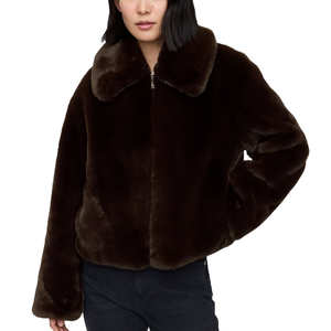A dark brown, faux-fur jacket with a plush, oversized collar and long sleeves, paired with dark pants.