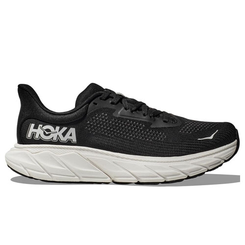 A black HOKA running shoe with a white logo and cushioned white sole.