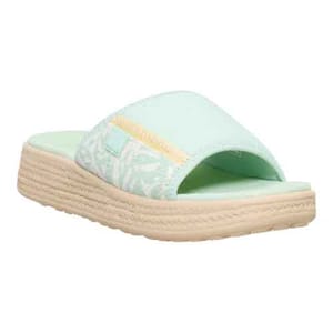 Mint green slide sandal with a fabric strap, decorative leaf patterns, and a beige, textured platform sole.