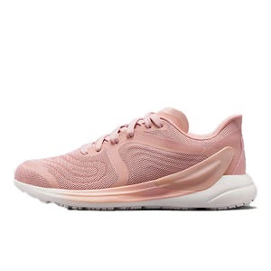 A pink running shoe with a streamlined design, featuring mesh fabric on the upper part and a white sole with black treads.