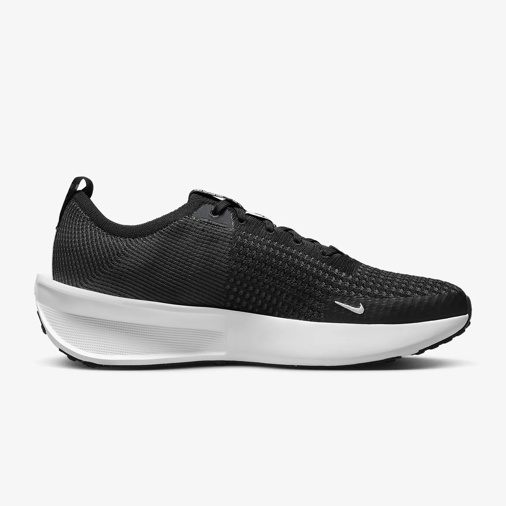 Black Nike athletic shoe with a white sole and a small white Nike swoosh logo on the side.