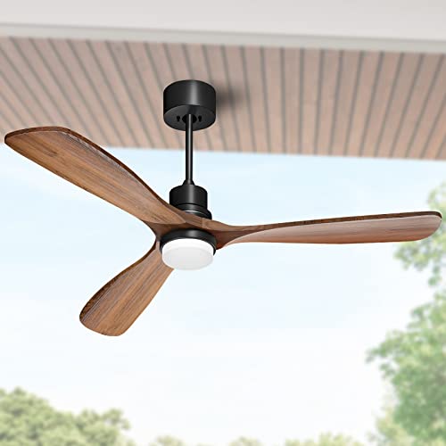 Ceiling fan with three wooden blades and a central light, mounted to a black motor housing suitable for indoor or outdoor use.
